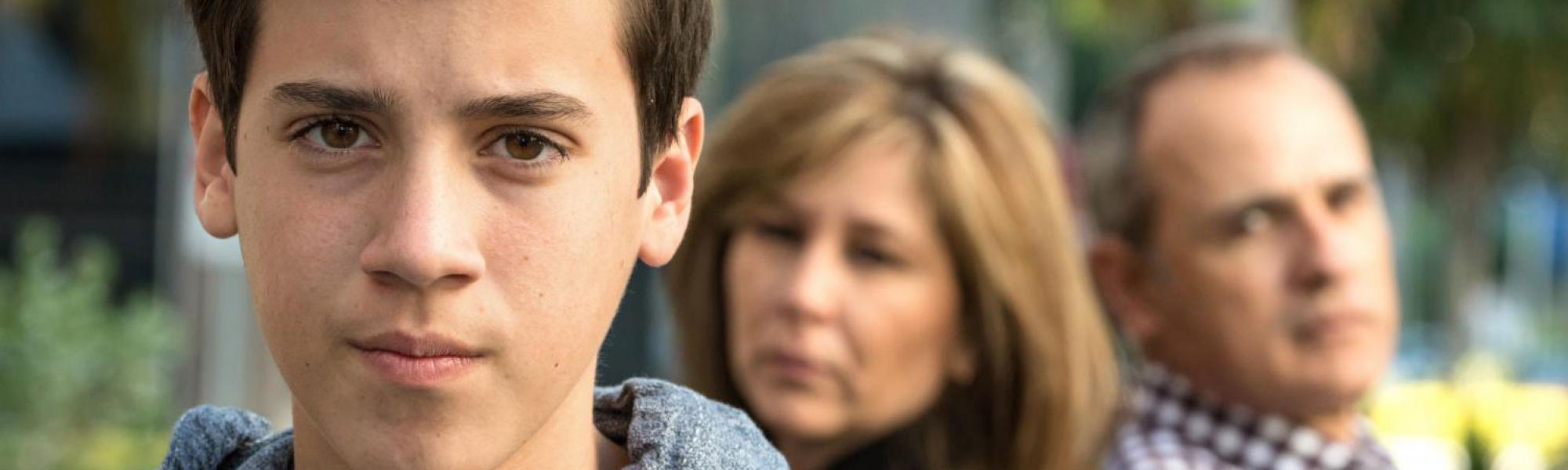 teen with parents